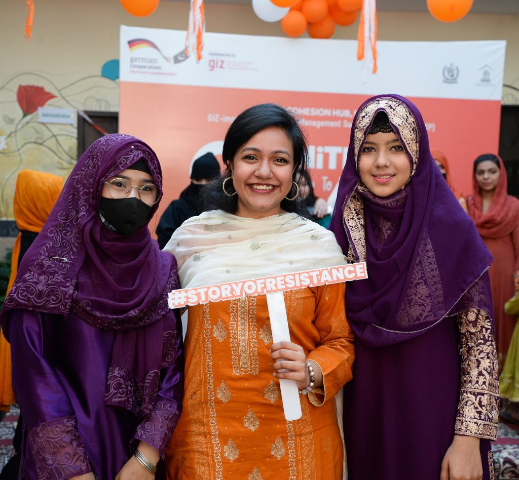 7 - Young refugee advocates posing for a picture with the GIZ team during the 16 Days of Activism against Gender Based Violence campaign in Karachi